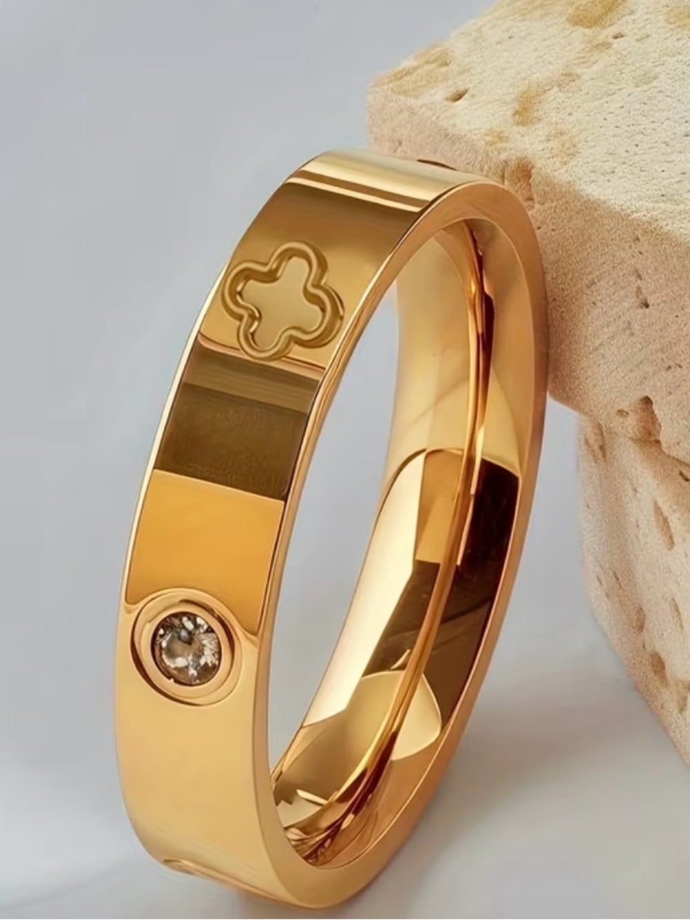 Gold Tone Clover Accent Bangle Bracelet with Crystal